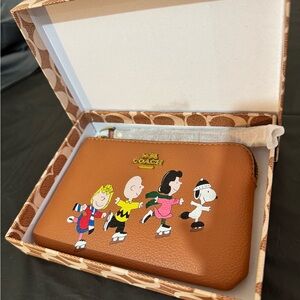 Coach Tan Wristlet X Peanuts Snoopy and Friends